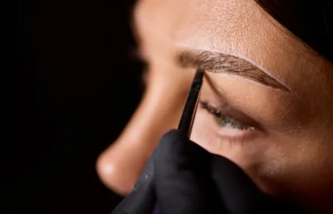Close-up of eyebrow tinting process